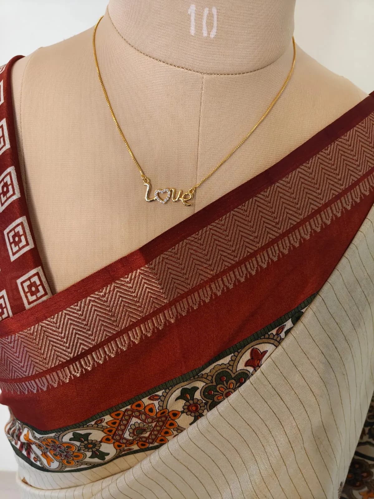 Off-White Saree with Coffee Border